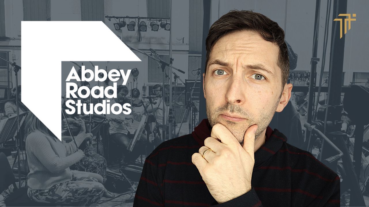 Richard Pryn beside the Abbey Road Studios logo with string players recording in the background