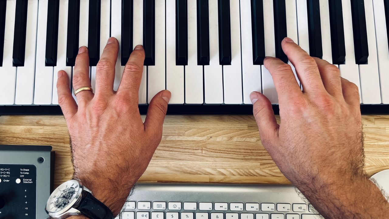 Write music for the piano for two hands